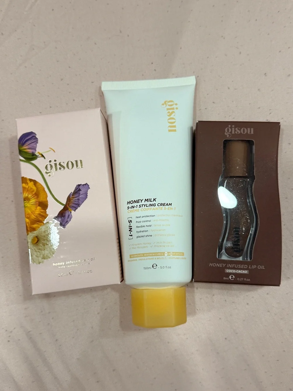 Gisou set (lip oil, 5 in 1 styling cream and honey infused hair oil)